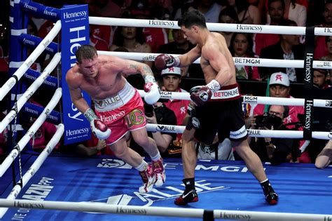 Dmitry Bivol stuns Canelo Alvarez on points to retain WBA light .